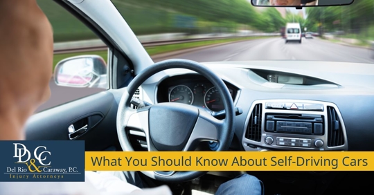 Man sitting in a self-driving car.